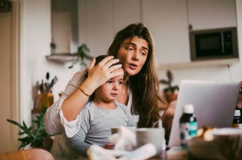 mother and sick child on a telehealth visit 